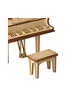 A close-up shot of a wooden toy piano and its bench. Podgląd zdjęcia produktu