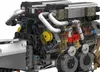 A close-up view of a detailed model engine. Voir les images du produit