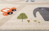 A close-up view of a children's rug with cartoonish animal and vehicle designs. Produktbild-Vorschau