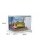 A 3D wooden model of a train station with a green train and cherry blossoms, displayed inside a clear acrylic case with dimensions indicated. Produktbild-Vorschau
