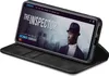 A black flip cover case for a smartphone is shown open, with the phone displaying a movie poster for 'The Inspector'. Produktbild-Vorschau