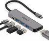 A USB-C hub and its connected cables are displayed on a white background. Produktbild-Vorschau