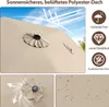 Close-up view of a beige umbrella canopy with illustrations and text highlighting its features. Produktbild-Vorschau