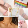 A collage of images showing various beaded jewelry, including bracelets, a necklace, and rings, worn by people or displayed. Produktbild-Vorschau