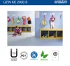 A child is putting on shoes in a room with cubbies and coat hooks. Produktbild-Vorschau