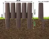 A garden border made of brown plastic stakes is shown partially inserted into the soil, with grass in the background. Dimensions are indicated with measurement lines and text. Náhled obrázku produktu
