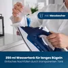 A person is pouring water into a steam iron. Náhľad obrázku produktu