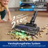 A child is playing on the floor while a vacuum cleaner head is shown in action, cleaning up cereal. Insets show comparisons of clogged vs. unclogged brush heads. Produktbild-Vorschau
