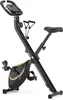 A black and gold folding exercise bike shown from a side-angle on a white background. Náhľad obrázku produktu