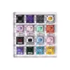 A grid of 16 different colored mechanical keyboard switches arranged in a clear acrylic holder. Produktbild-Vorschau