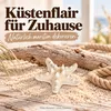 Weiße Seesterne als Streudeko auf einer gedeckten Hochzeitstafel Produktbild-Vorschau