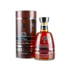 A bottle of Arehucas rum and its cylindrical packaging. Produktbild-Vorschau