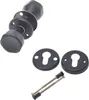 A set of black door knobs and related hardware, including two keyhole escutcheons and two connecting screws, are displayed against a white background. Podgląd zdjęcia produktu