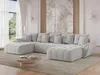 A modern living room with a large U-shaped sectional sofa. Produktbild-Vorschau