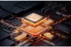 A close-up, stylized view of a computer chip and surrounding circuitry, with glowing orange lights. Podgląd zdjęcia produktu