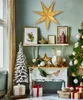 A festive Christmas display with a decorated tree, gifts, and decorative elements. Náhled obrázku produktu