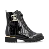 A black patent leather boot with gold accents. Produktbild-Vorschau