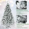 A marketing image of a snow-covered artificial Christmas tree with feature callouts. Produktbild-Vorschau