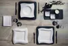 A top-down view of a table setting with Villeroy & Boch New Wave plates and cutlery. Produktbild-Vorschau