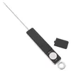 A digital thermometer with a probe and a detached battery cover. Produktbild-Vorschau