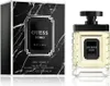 A bottle of Guess Uomo Eau de Toilette and its packaging are displayed side-by-side against a white background. Voir les images du produit
