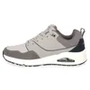 A side view of a gray Skechers sneaker. Voir les images du produit