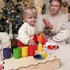 Giocattolo montessoriano in legno "Bambolina con tappo in Anteprima dell’immagine prodotto 5