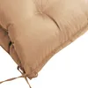 A close-up view of a taupe cushion, showing its tufted design and tie. Náhled obrázku produktu