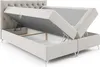 A beige upholstered boxspring bed with its storage compartment open, revealing the interior. Náhled obrázku produktu