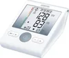 A white digital blood pressure monitor is shown from a slightly elevated front-left angle on a white background. Voir les images du produit