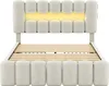 A beige upholstered bed frame with a slatted mattress base and integrated LED lighting in the headboard. Náhled obrázku produktu