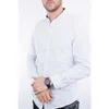 A man wearing a white shirt and a watch. Anteprima dell’immagine prodotto