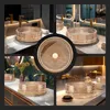 A collage of images showcasing a rose gold glass vessel sink in various bathroom settings. Anteprima dell’immagine prodotto