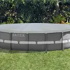 An above-ground swimming pool with a cover, set up on a grassy lawn. Podgląd zdjęcia produktu