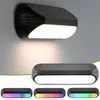 A collage of solar-powered wall lights, showing one mounted on a wall and three different color options. Produktbild-Vorschau