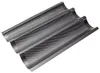 A three-channel baguette baking pan with a perforated surface. Anteprima dell’immagine prodotto