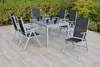 An outdoor patio setting with a dining set. Produktbild-Vorschau