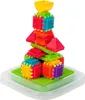 A colorful tower built from interlocking blocks, placed on a green base within a clear plastic tray. Voir les images du produit