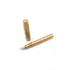 A brass fountain pen with its cap off, resting on a white surface. Produktbild-Vorschau