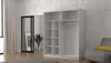 A white sliding door wardrobe is shown in a room with a textured wall and a gray armchair with a yellow cushion. Náhled obrázku produktu
