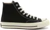 A studio shot of a black Converse Chuck 70 high-top sneaker. Voir les images du produit