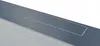 A close-up, angled view of a gray, rectangular surface with a recessed, elongated rectangular outline, suggesting a cover or access panel. Produktbild-Vorschau