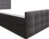 A close-up view of a dark gray upholstered boxspring bed with a tufted headboard adorned with rhinestones. Náhled obrázku produktu