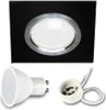 A product shot of a black square recessed spotlight with a silver trim, a white LED bulb, and a white GU10 socket with wires. Náhled obrázku produktu