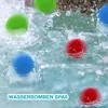Colorful balls splashing in water. Produktbild-Vorschau