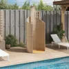 An outdoor shower is set up on a wooden deck next to a swimming pool, with lounge chairs and plants in the background. Produktbild-Vorschau