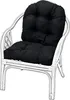 A white rattan chair with black cushions. Anteprima dell’immagine prodotto