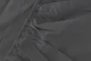 A close-up view of a dark gray fitted sheet, showing the elasticized edge. Produktbild-Vorschau