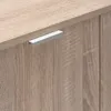 A close-up view of a wooden cabinet door with a silver handle. Produktbild-Vorschau