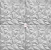 A seamless pattern of 3D wall panels with a marble texture. Produktbild-Vorschau